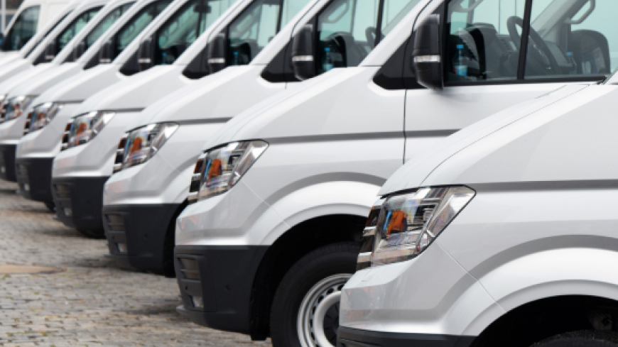 Row of vans parked