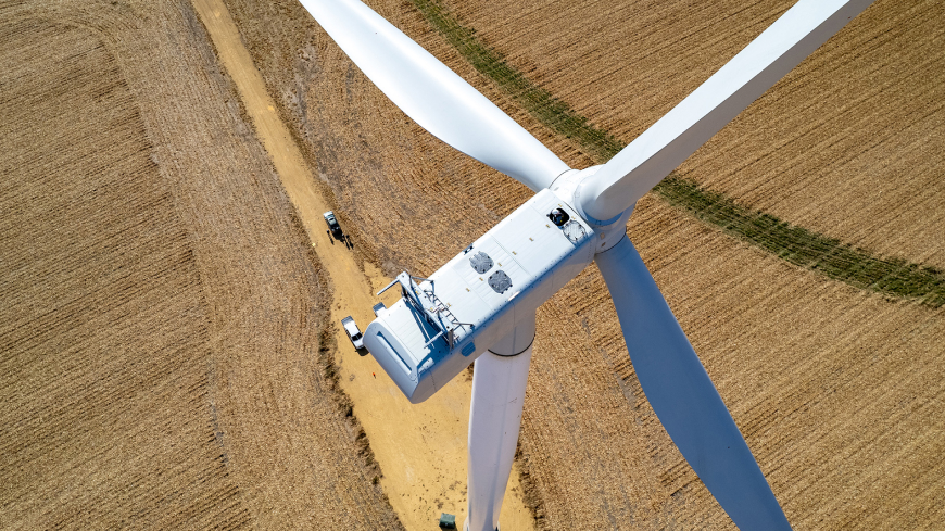close up shot of wind turbine on a wind farm