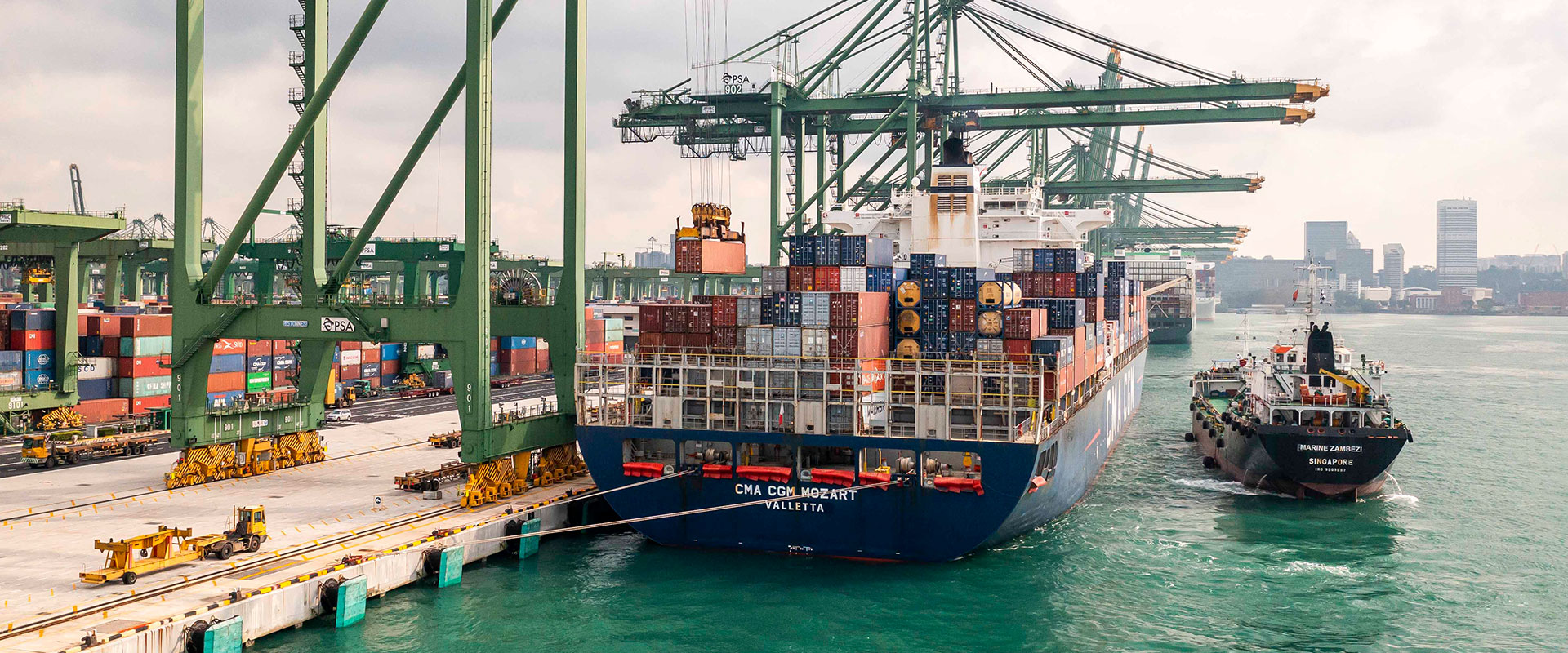 Bunker barge refueling ship at Singapore harbour