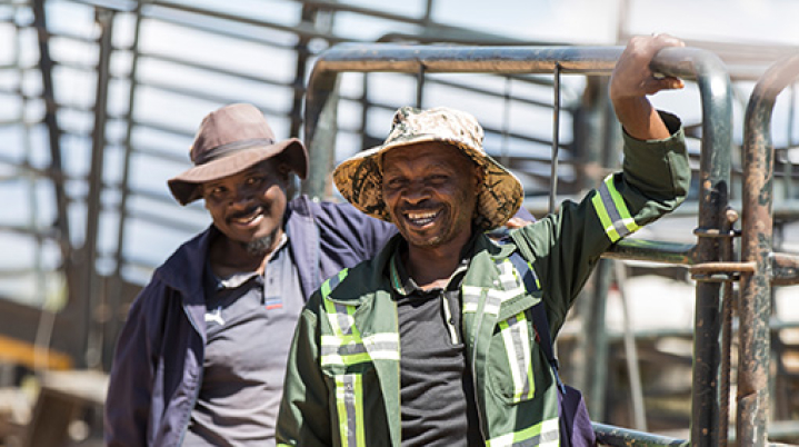 2 men smiling at work in Africa